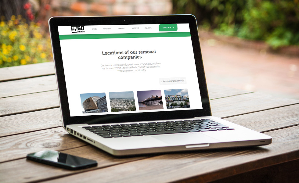 Innovative Welsh Website Design Displayed on Laptop in Outdoor Setting
