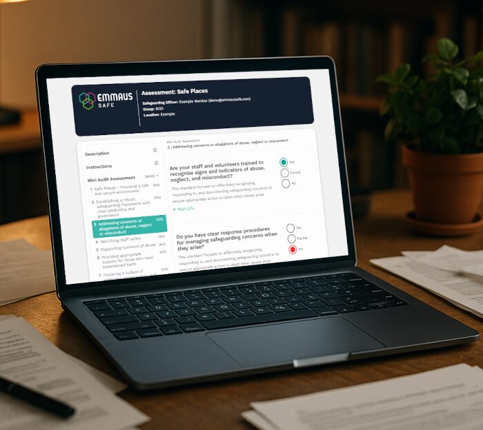 Interactive web assessment tool on a laptop showcasing user interface design developed in Wales