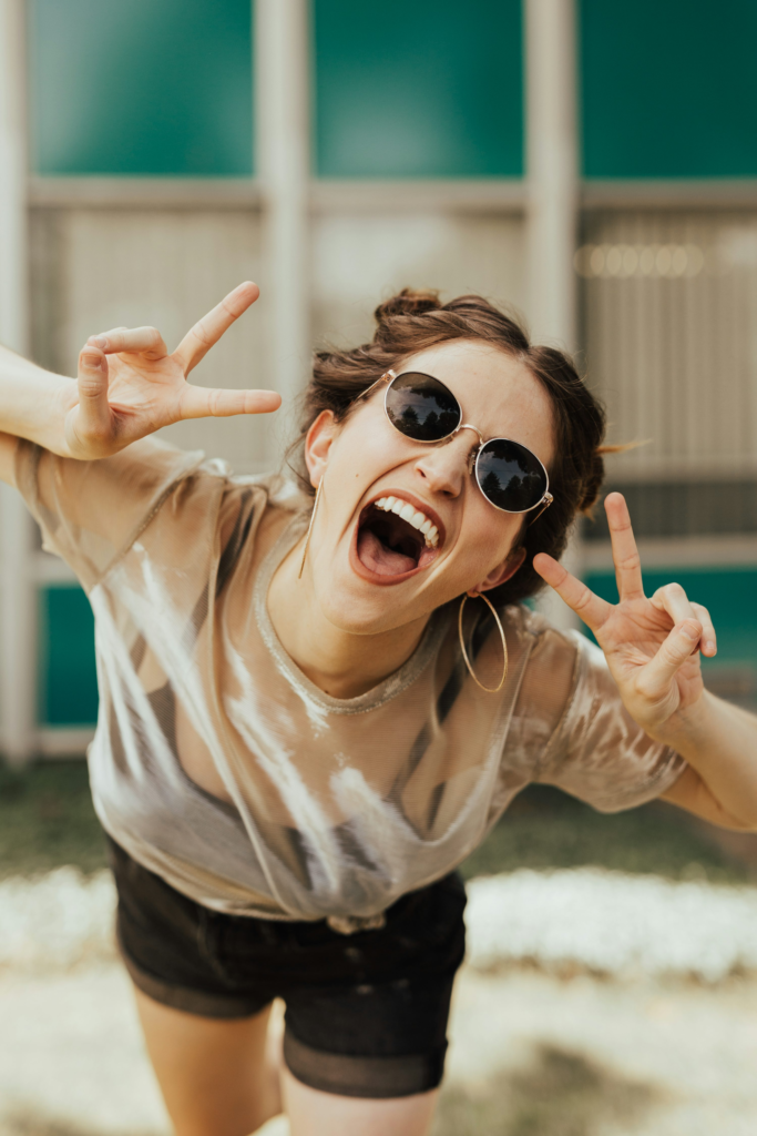 A person looking at the camera with excitement about Clickboom website builds