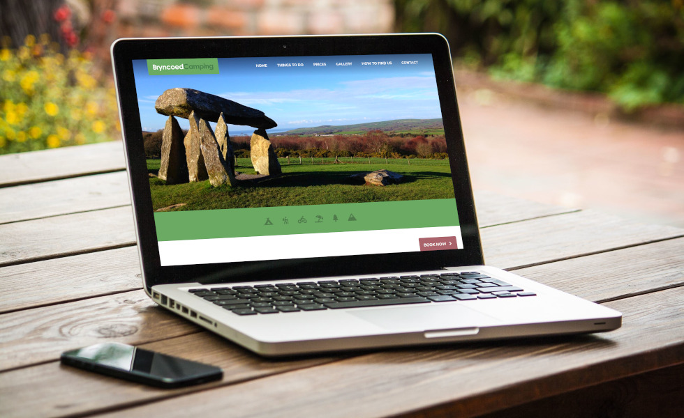 Laptop with a website related to Web Design Pembrokeshire