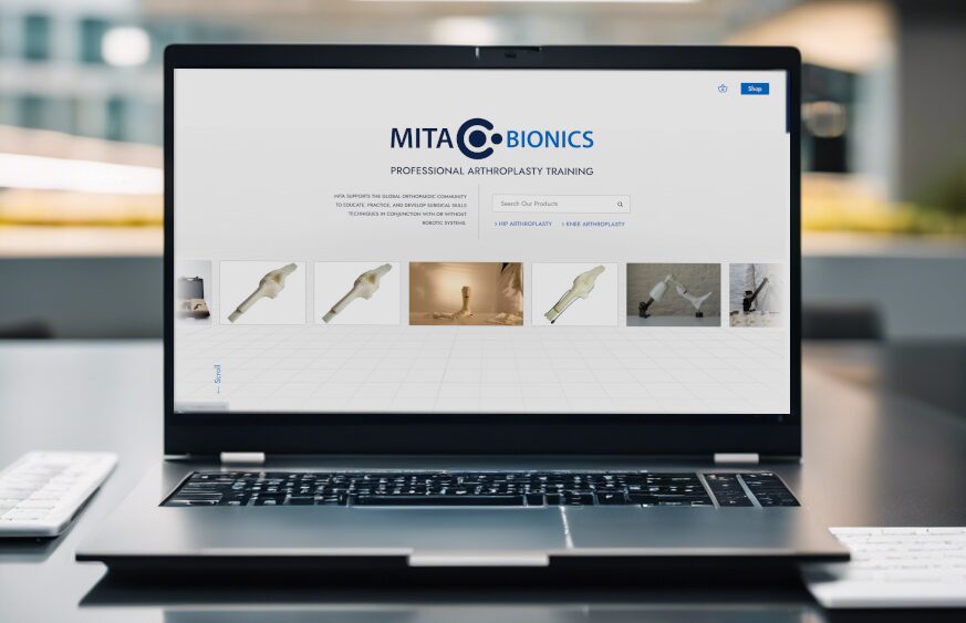 Innovative Cardiff web design showcasing MITA Bionics orthopedic training platform on a laptop screen.